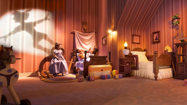 Interior of Peter Pan's flight ride, showing Wendy, Paul and Michael's in the nursery and Peter's shadow on the wall