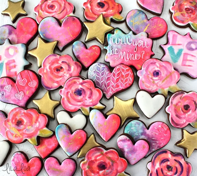 Decorated Valentine's Day watercolor sugar cookies -- roses, hearts, and gold stars