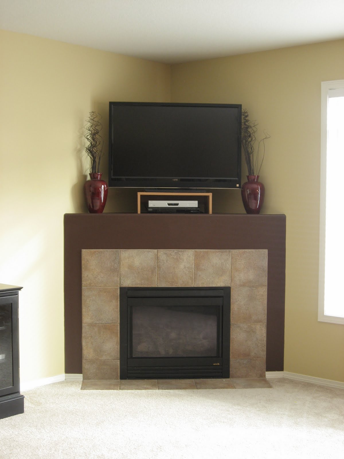 Fireplace And Abstract Sofa Decor In Traditional Living Fireplace