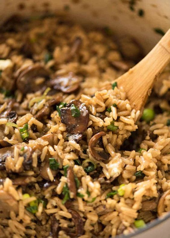One for mushroom lovers! Brown the mushrooms well so the base of the pot turns brown, then deglaze it with broth so all that flavour ends up in the rice as well as staining it a lovely earthy brown colour. Also see Baked Mushroom Rice!