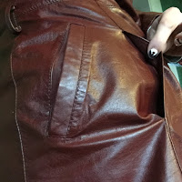 photo of the hidden second outer pocket on the Etienne Aigner leather jacket