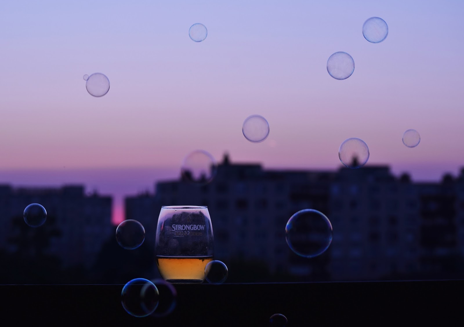 Sunset drink with bubbles on the 8th floor