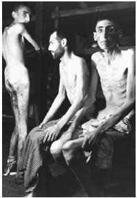 Starving men in Nazi concentration camp