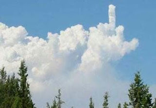 CLOUDS FORMING MIDDLE FINGER