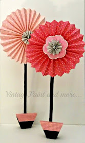 Vintage, Paint and more... giant pinwheel flowers made from scrapbook paper and scrap lumber