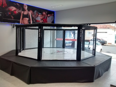 cage ufc octogono locação ringue locação fábrica venda loja tatame de eva lona saco de pancada suporte eva luva trilho