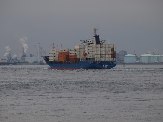 LANTAU BAY container ship passing by Kitakyushu factories and pollution