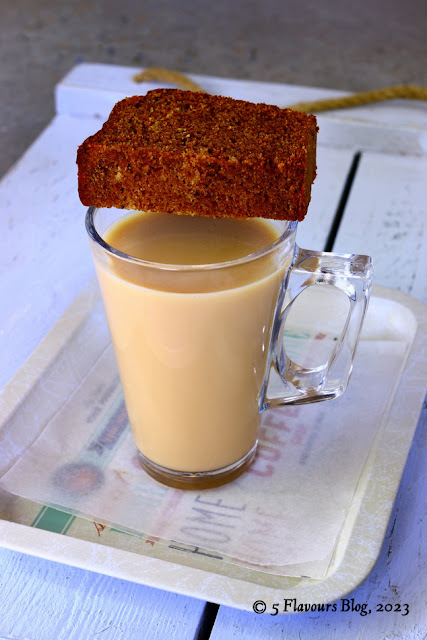 Half Slice of Date & Prune Loaf on Mug of Tea