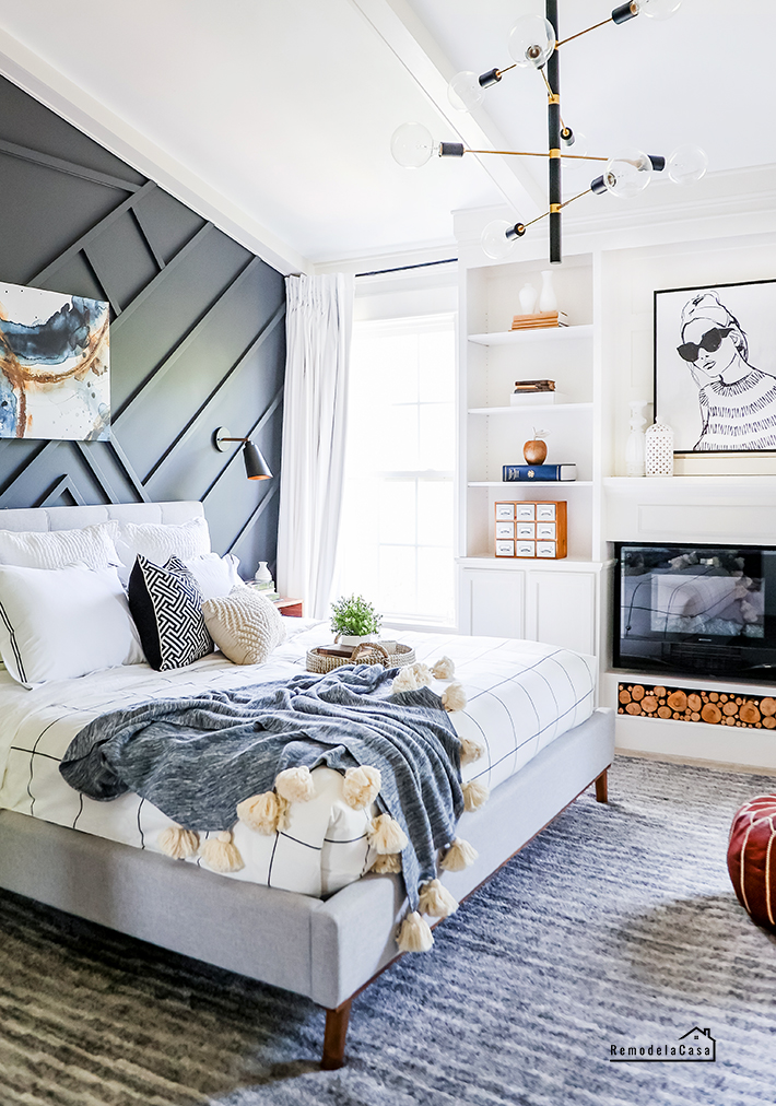 bedroom with dark accent wall