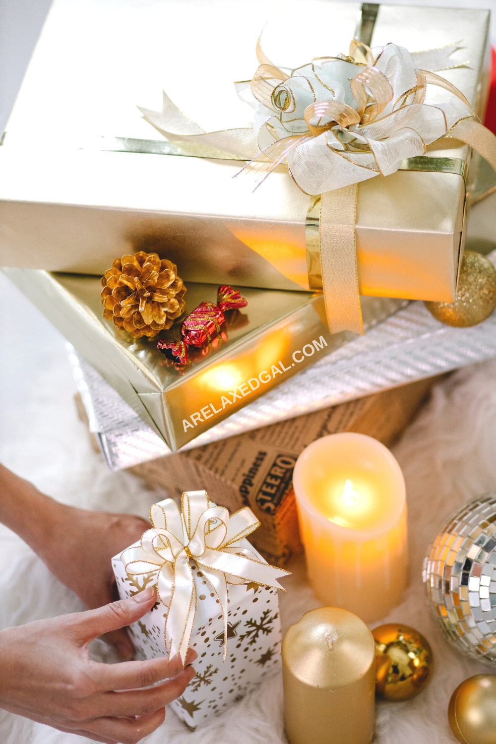 women placing gold wrapped gifts from sally beauty.