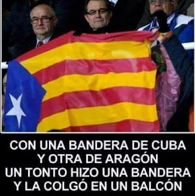 Con una bandera de Cuba y otra de Aragón un tonto hizo una bandera y la colgó en un balcón