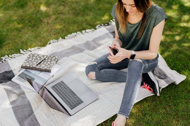 Women check smartphone