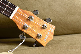 Kmise Carved Cat Concert Ukulele headstock