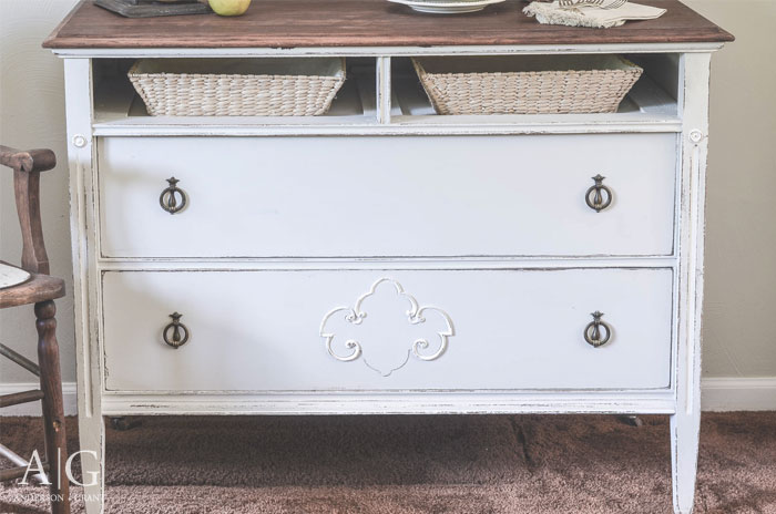 A broken antique dresser is given a makeover and repurposed as a dining room buffet.  |  www.andersonandgrant.com