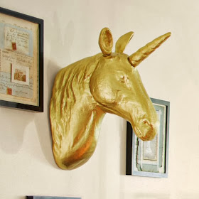 http://www.pbteen.com/products/emily-meritt-unicorn-wall-mount/?pkey=cemily-meritt-collection&