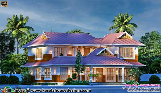 Exquisite Kerala Traditional House with Sloping Roof and Laterite Stone Exterior