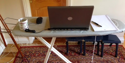 How you can use an ironing board to sit less