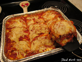 Serving Lasagna From the Oven