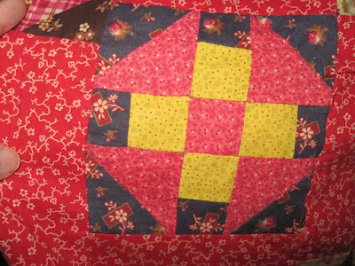 red and chrome yellow antique churndash quilt block