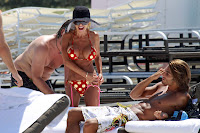 Shauna Sand Stuffed Into A Little Polka Dot Bikini At The Beach