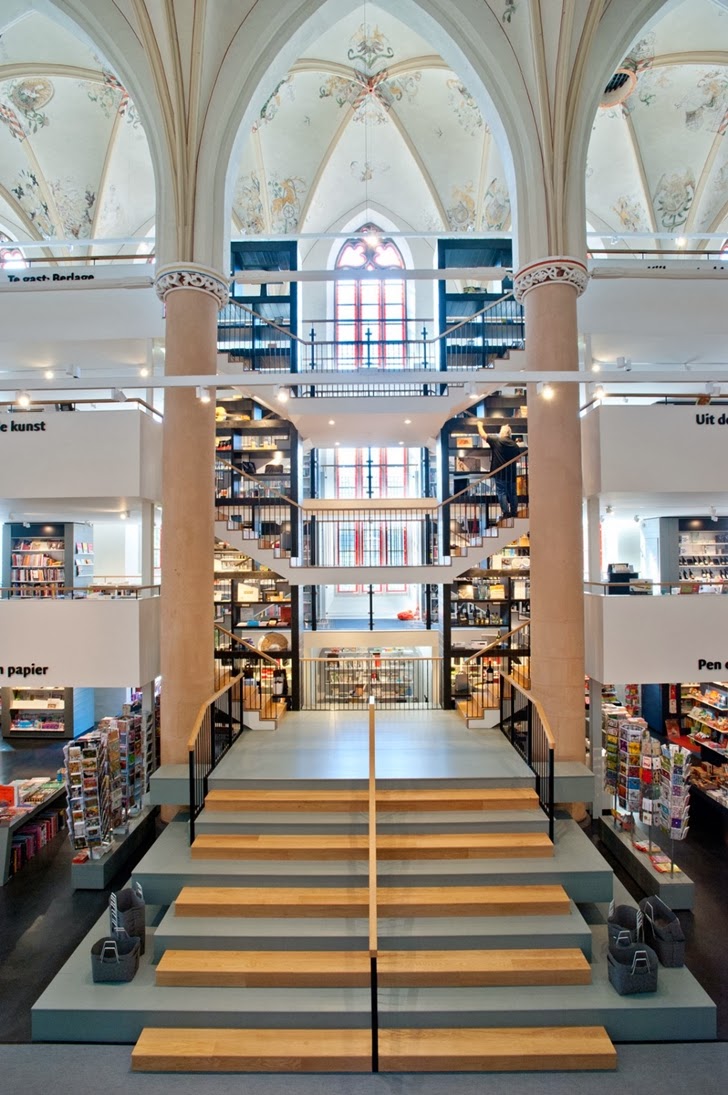 Interior of modern bookstore in old cathedral, the Netherlands