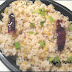 Rice Rava Upma with chana daal and scallion garnish