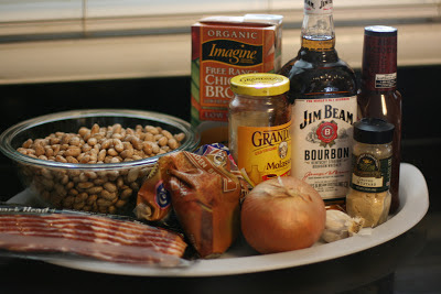  these are going to be a HIT at your next tail gate Slow Cooker Bourbon Baked Beans