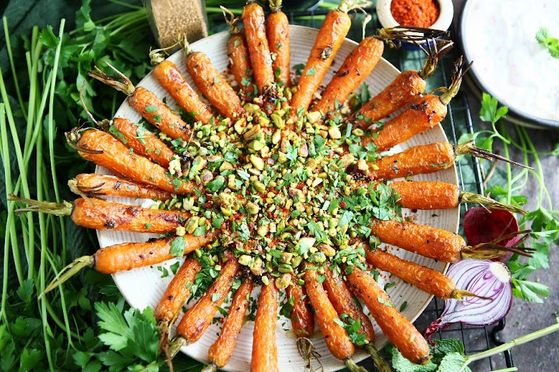 Panch Phoron Roast Carrots with Raita and Pistachios