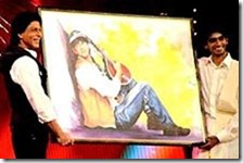 SRK_holding_painting_of_DDLJ