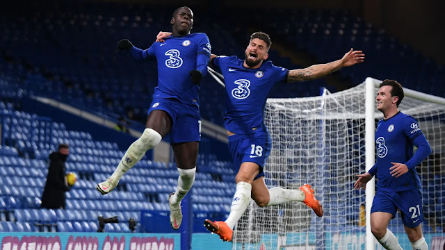 Chelsea players Kurt Zouma and Olivier Giroud celebrates goal