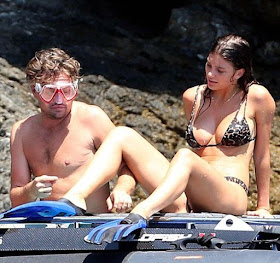 Looking trim, tan, and terrific, Camila Morrone, 21, stunned yet in bikini at Nerano, Italy. The incredible lady was snapping enjoyed her snorkeling momentt with boyfriend, Leonardo Di Caprio, 43, on Monday, August 8, 2018.