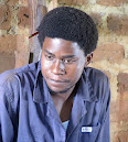 Christmas in Kampala (2010): Patrick Mukasa as Joseph at his Carpentry Workshop