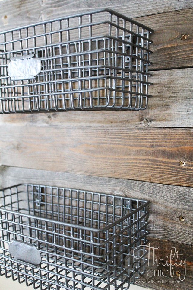 DIY Farmhouse Style Hanging Wire Baskets On Reclaimed Wood