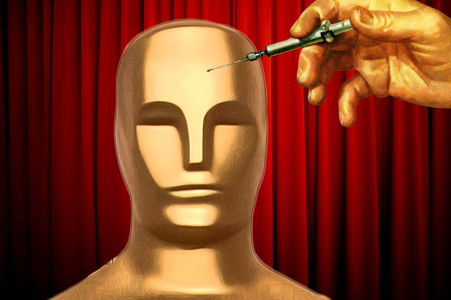 statuetta dorata degli Hollywood Awards e una siringa