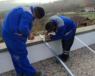 Bekir and Halil work on assembling the frame