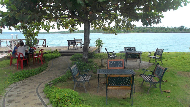 garden tables and chairs under a Talisay Tree at Tanghay View Lodge in Guiuan Eastern Samar