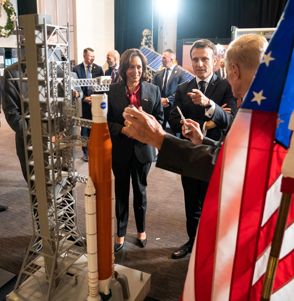NASA Administrator Bill Nelson shows a miniature replica of the Space Launch System rocket to U.S. Vice President Kamala Harris and French President Emmanuel Macron at NASA Headquarters in Washington, DC...on November 30, 2022.