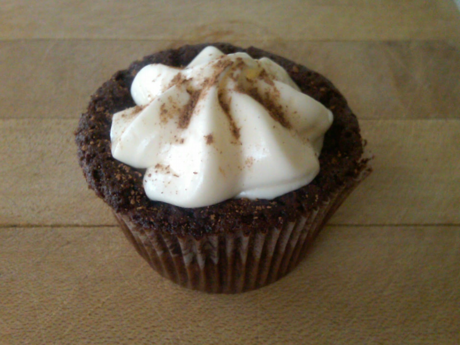 chocolate cupcakes with chocolate icing  : Chocolate Whiskey Cupcake topped with Whiskey Buttercream Frosting