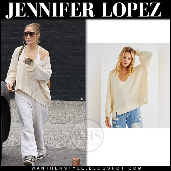 Jennifer Lopez in cream oversized sweater and white baggy pants