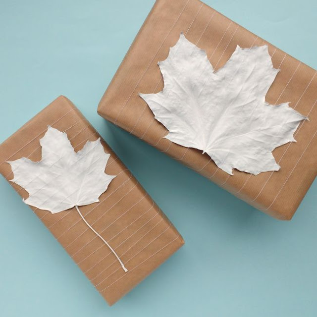 simple parcels decorated with painted leaves