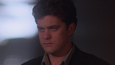 Pacey looking completely demoralized outside Dawson's house