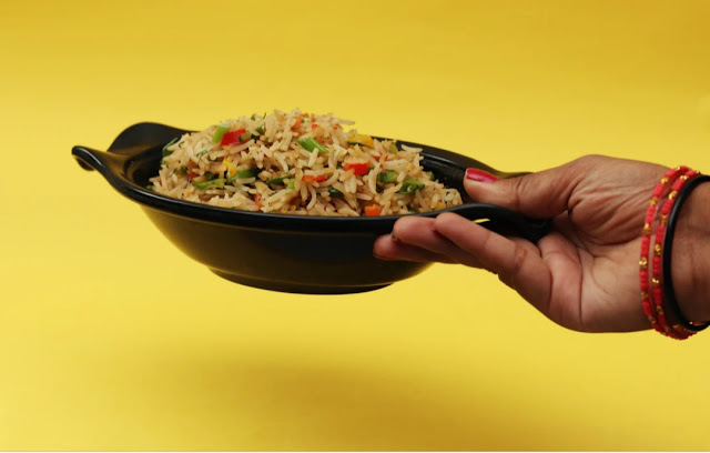 <img src="Fried rice.png" alt="A plate of Nigerian fried rice