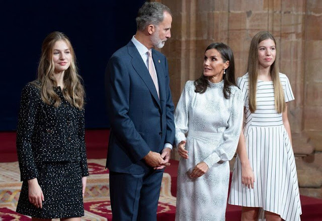 Queen Letizia in Cherubina dress. Infanta Sofia in Hugo Boss Kesha dress. Princess Leonor in Carolina Herrera tweed jacket and skirt
