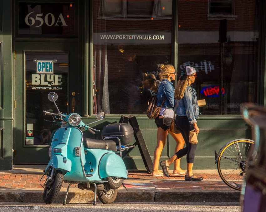 Portland, Maine USA July 2016 photo by Corey Templeton. A blue moped parked in front of Blue, at 650 Congress Street,