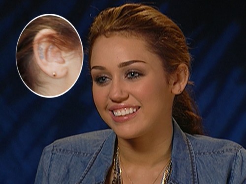 Miley Cyrus#39; ear tattoo.