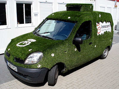 Car Covered In Grass