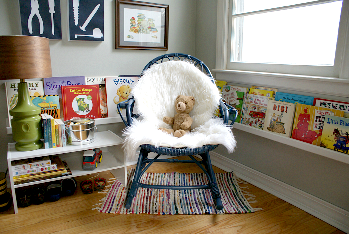 Boy's room reading nook with rocker and book ledges