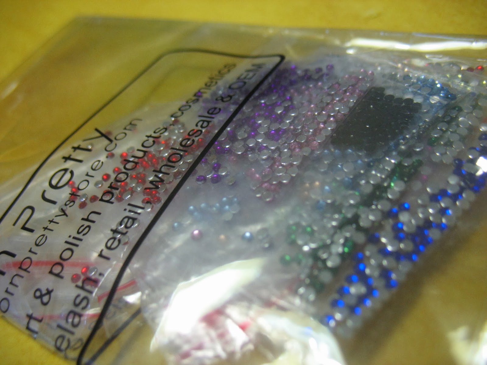 http://www.bornprettystore.com/100pcs-15mm-colorful-rhinestone-acrylic-nail-colors-p-4995.html