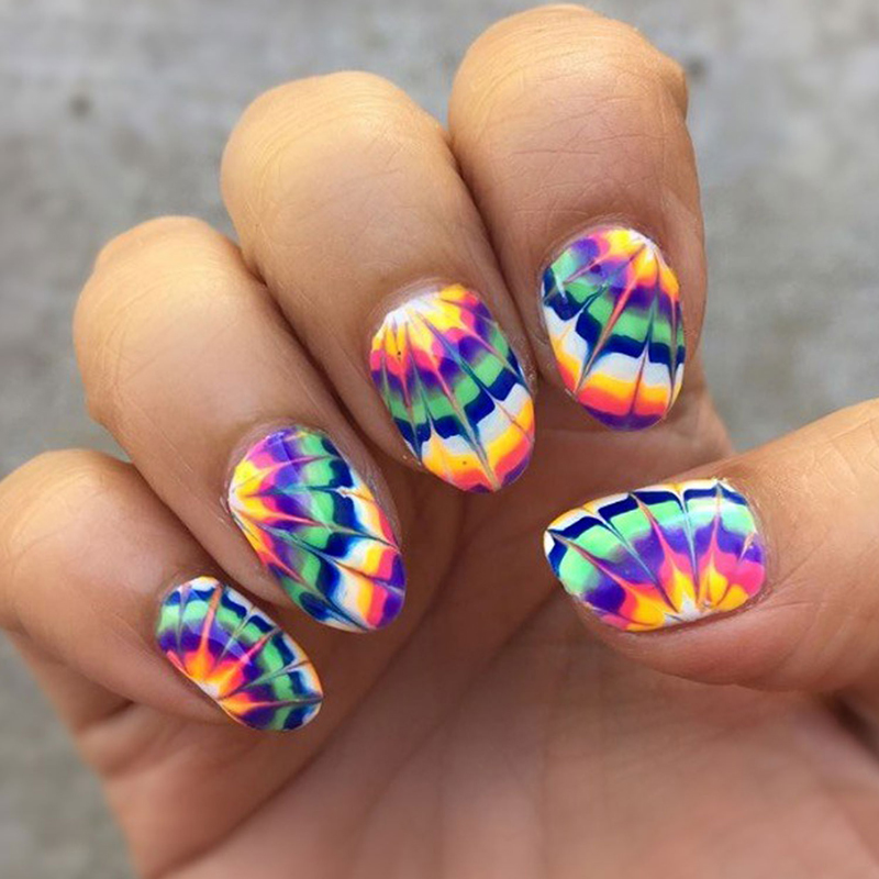 10 Groovy Tie-Dye Nail Looks That Everyone Needs To Try