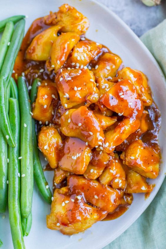 Skip the takeout and make this Healthy Orange Chicken Recipe for dinner! A simple, delicious dinner that is paleo, gluten free, packed with flavor and done in under an hour!